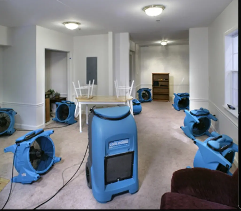 Air movers and dehumidifier setup for Water Damage Restoration in Tuba City